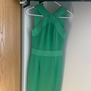 Green tight dress. Used, but in really good condition.